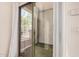 A patio with turf, slider to the living room, and a view to the street at 2401 E Rio Salado Pkwy # 1048, Tempe, AZ 85288