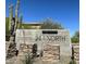 Monument sign for 24 North community surrounded by desert landscaping and beautiful Arizona sky at 2412 W Gloria Ln, Phoenix, AZ 85085