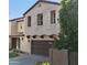 Beautiful two-story home with well-maintained landscaping, a two-car garage, and a charming entrance at 2412 W Gloria Ln, Phoenix, AZ 85085