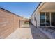 Backyard featuring a stone-scaped yard and covered patio at 29481 W Mitchell Ave, Buckeye, AZ 85396