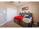 Bedroom with built in drawer storage, closet and a ceiling fan at 29481 W Mitchell Ave, Buckeye, AZ 85396