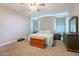 Spacious bedroom with neutral colors and a ceiling fan to stay cool at 29481 W Mitchell Ave, Buckeye, AZ 85396
