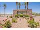 An eye catching entrance sign to the Tartesso community with colorful flowers at 29481 W Mitchell Ave, Buckeye, AZ 85396