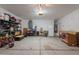 Spacious garage featuring ample storage, shelving, and a well-lit area for projects and parking at 29481 W Mitchell Ave, Buckeye, AZ 85396