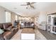Spacious living room seamlessly connecting to the kitchen, offering an open-concept layout and modern design at 29481 W Mitchell Ave, Buckeye, AZ 85396