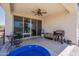 Cozy covered patio with ceiling fan, overlooking a Gathering-friendly backyard at 29481 W Mitchell Ave, Buckeye, AZ 85396