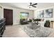 Inviting living room with stylish furnishings, a ceiling fan, and a bright window at 3050 E Cholla E St, Phoenix, AZ 85028