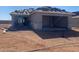 New home under construction, featuring the start of a new roof and an attached two-car garage at 32282 N Pony Express Rd, San Tan Valley, AZ 85143
