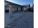 Cozy home with covered carport, side gravel and convenient trash storage at 3328 E Crescent Ave, Mesa, AZ 85204