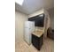 Kitchen features a white refrigerator and a dark cabinet at 3328 E Crescent Ave, Mesa, AZ 85204