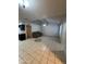 Open living room boasts tile flooring and a ceiling fan at 3328 E Crescent Ave, Mesa, AZ 85204