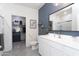 Stylish bathroom boasts updated fixtures and ample storage space at 36076 W Santa Barbara Ave, Maricopa, AZ 85138