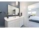 Modern bathroom features a sleek vanity with updated fixtures at 36076 W Santa Barbara Ave, Maricopa, AZ 85138