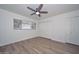 Bedroom with white brick wall, window, and closet at 3637 E Monterosa St # 8, Phoenix, AZ 85018