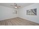 Bedroom with ceiling fan and two large windows at 3637 E Monterosa St # 8, Phoenix, AZ 85018