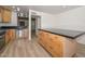 View of the kitchen with a center island and stainless steel dishwasher at 3637 E Monterosa St # 8, Phoenix, AZ 85018