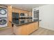 Spacious kitchen boasts an island and stainless steel appliances at 3637 E Monterosa St # 8, Phoenix, AZ 85018