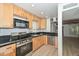 Kitchen offers stainless steel appliances, ample counter space and light colored wood cabinets at 3637 E Monterosa St # 8, Phoenix, AZ 85018
