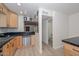 View of the kitchen featuring a stainless steel dishwasher and view to a bathroom at 3637 E Monterosa St # 8, Phoenix, AZ 85018