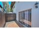 Private patio area with brick floor and sliding glass door that lets in an abundance of light at 3637 E Monterosa St # 8, Phoenix, AZ 85018