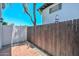 Cozy private patio with brick accents, wooden fence, and space for outdoor seating at 3637 E Monterosa St # 8, Phoenix, AZ 85018