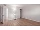 Clean bedroom features wood-look flooring and ample closet storage at 3812 W Seldon Ln, Phoenix, AZ 85051