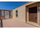 Back porch of single-Gathering home with awning and access to home at 3952 E Baywood Ave, Mesa, AZ 85206