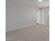 Neutral bedroom with carpet floors, closet and natural light from windows at 3952 E Baywood Ave, Mesa, AZ 85206