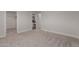 Spacious bedroom featuring carpet floors, neutral walls, and walk-in closet at 3952 E Baywood Ave, Mesa, AZ 85206