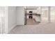 Bright kitchen with stainless steel appliances, white cabinetry, and grey countertops at 3952 E Baywood Ave, Mesa, AZ 85206