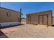 Exterior view of two sheds with ramps in a gravel yard at 3952 E Baywood Ave, Mesa, AZ 85206