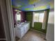 Bathroom with colorful walls, a single sink vanity and decorative ceiling at 4112 S Grandview Ave, Tempe, AZ 85282