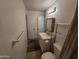 Modest bathroom with vanity, mirror, and tile flooring at 4112 S Grandview Ave, Tempe, AZ 85282