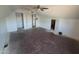 Spacious bedroom with ceiling fan and a neutral palette, awaiting personalized touches for a cozy retreat at 4112 S Grandview Ave, Tempe, AZ 85282