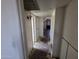 Hallway view, with attic bedroom visible at the end, and small closet to the left at 4112 S Grandview Ave, Tempe, AZ 85282