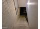 Painted stairwell with handrail leading to basement with white walls at 4112 S Grandview Ave, Tempe, AZ 85282