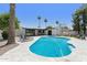 Beautiful backyard with a refreshing pool and stylish patio furniture for outdoor enjoyment at 4842 E Surrey Ave, Scottsdale, AZ 85254