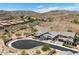 Stunning aerial view of a neighborhood nestled in the desert with beautiful mountain views at 520 E Ashurst Dr, Phoenix, AZ 85048