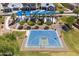 Aerial view of a community basketball court and playground with shade structures and mature landscaping at 520 E Ashurst Dr, Phoenix, AZ 85048