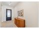 Welcoming entryway with modern decor, tiled floors, and ample natural light creates a warm ambiance at 520 E Ashurst Dr, Phoenix, AZ 85048