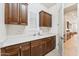 Mud room with ample counter space, storage cabinets, a sink and white countertops at 520 E Ashurst Dr, Phoenix, AZ 85048