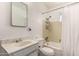 Bathroom featuring a sink and vanity combo, a toilet, and a shower and bathtub combo at 539 E Pebble Beach Dr, Tempe, AZ 85282