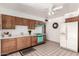 Bright kitchen featuring a retro turquoise stove, white appliances and tile flooring at 539 E Pebble Beach Dr, Tempe, AZ 85282