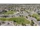 Aerial view of the neighborhood showcasing green spaces and community amenities, including a playground at 549 E Quentin Ln, San Tan Valley, AZ 85140