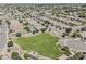 This aerial photo highlights the community's lush green landscape and single-Gathering homes at 549 E Quentin Ln, San Tan Valley, AZ 85140
