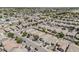 This aerial image reveals a tranquil residential area with consistent architecture and community green spaces at 549 E Quentin Ln, San Tan Valley, AZ 85140