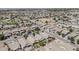 Wide aerial shot of homes and community spaces with green common areas in a Gathering-friendly neighborhood at 549 E Quentin Ln, San Tan Valley, AZ 85140