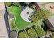 Aerial view of a property boasting an inviting backyard with patio, lush lawn, and manicured landscaping at 549 E Quentin Ln, San Tan Valley, AZ 85140