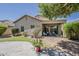 This backyard features a covered patio and a partially shaded yard, perfect for outdoor living at 549 E Quentin Ln, San Tan Valley, AZ 85140
