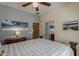 Inviting bedroom featuring a ceiling fan, a comfortable bed, and soothing wall colors at 549 E Quentin Ln, San Tan Valley, AZ 85140